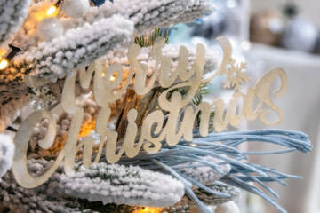 The inscription on the Christmas tree Merry Christmas