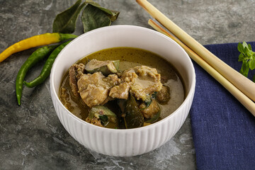 Thai green curry soup with basil