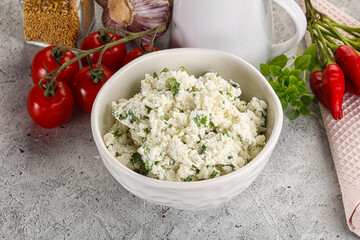 Curd cheese with green herbs