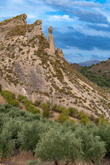 "The friar": Natural rock formation originated by the erosion of the wind that has sculpted the rock to give it this shape, icon of the Granada town of Beas de Granada