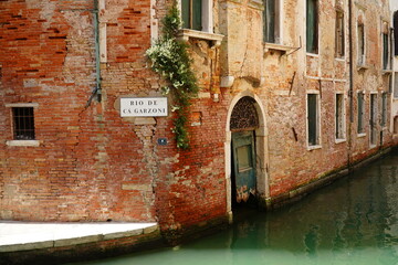 Salt damage to old bricks and marble in Venice, due to repeated flooding with salt water from the...