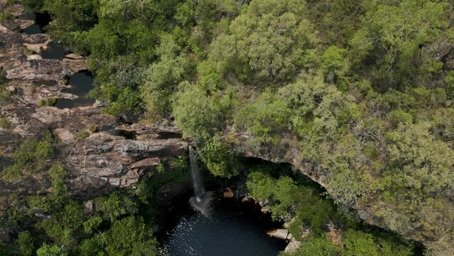 Drone footage of the scenic waterfall Chorro San Luis embedded in a thick, tropical forest near Robor&eacute; in the lowlands of Bolivia - Traveling and exploring South America - natural look