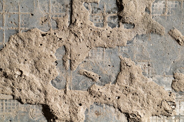 Fototapeta premium Cracked and abstract grunge texture. Aged material surface backdrop. Weathered effect pattern. Old and dirty background.