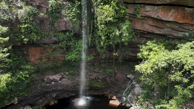 Drone footage of the scenic waterfall Chorro San Luis embedded in a thick, tropical forest near Robor&eacute; in the lowlands of Bolivia - Traveling and exploring South America - natural look