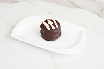 Alfajor de chocolate con dulce de leche
