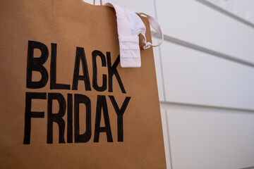 Black friday shopping bag with underwear edge which it is bra - obrazy, fototapety, plakaty
