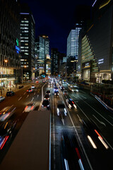 Fototapeta na wymiar 陽が落ちて大都会のビル群の光が輝く夜景。大阪梅田にて撮影