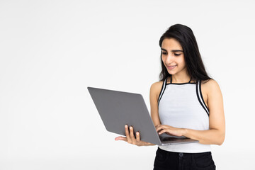 Indian woman or employee using laptop on white background.