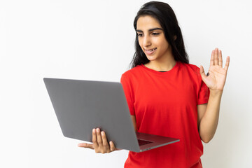 Indian woman using laptop have video call on white background.