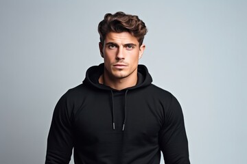 Obraz premium photo of a stylish man in a fashionable warm suit. On a light background. Style and fashion concept