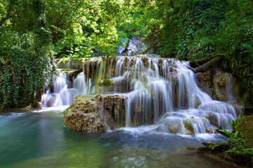 Fototapeta na wymiar Cascade waterfalls. Krushuna falls in Bulgaria near the village of Krushuna, Letnitsa.