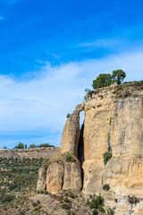 Panoramic view of Puente Nuevo Bridge on sunny day in Ronda, Spain