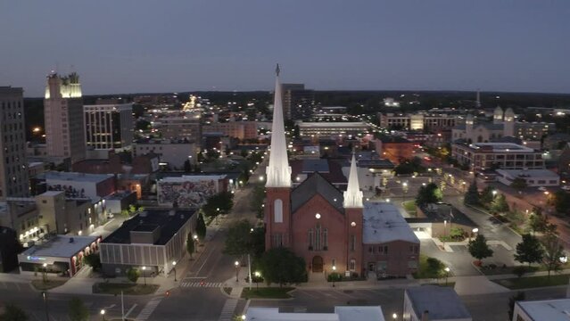 Jackson Michigan Aerial drone view of a city during sunset 