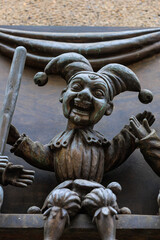 Ancient sculptures in the architecture of the city. Historical and cultural heritage. Background.