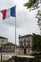 View on old streets and houses in Cognac white wine region, Charente, walking in town Cognac with...