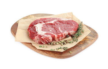 Piece of fresh beef meat, thyme and spices on white background