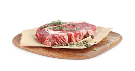 Piece of fresh beef meat, thyme and spices on white background