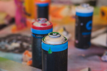 Equipment set for street art, spray cans bottles with aerosol spray paint, creating graffiti and...