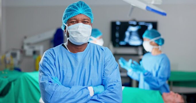 Man, surgeon and arms crossed, face mask and confidence with help, support and trust in healthcare. Portrait, PPE and cardiology doctor in operation theater for surgery and medical professional