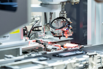 robot arm working in car factory