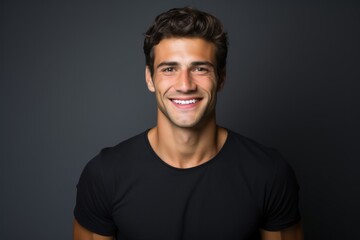 Fototapeta premium Portrait of a Happy Fictional Beautiful White Man Smiling Candidly. Isolated on a Plain Colored Background. Generative AI. 