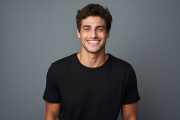Obraz premium Portrait of a Happy Fictional Handsome Man Model Smiling Candidly. Isolated on a Plain Colored Background. Generative AI. 