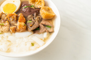paste of rice flour or boiled Chinese pasta square in clear soup