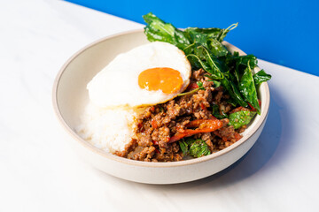  Stir fried Thai basil with wagyu beef and fried egg