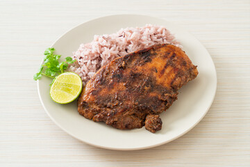 spicy grilled Jamaican jerk chicken with rice