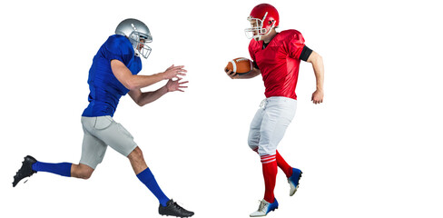 Digital png photo of two american football players with ball on transparent background © vectorfusionart