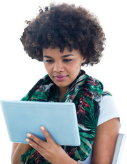 Digital png photo of focused biracial woman with curly hair using tablet on transparent background