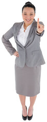 Digital png photo of happy asian businesswoman pointing finger on transparent background