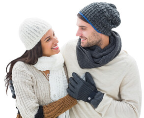 Digital png photo of diverse couple with winter hats and scarfs embracing on transparent background