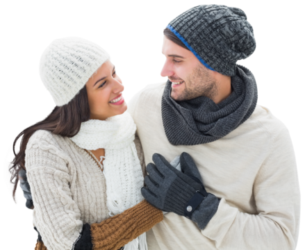Digital png photo of diverse couple with winter hats and scarfs embracing on transparent background