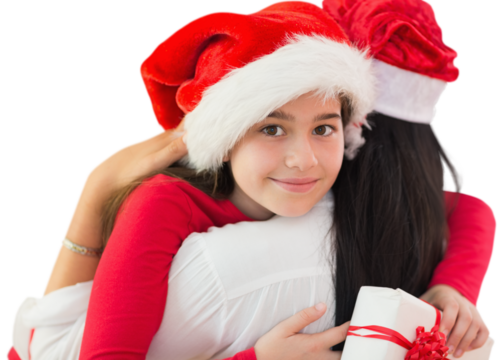 Digital png photo of caucasian mother, daughter in santa hats embracing on transparent background