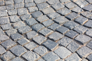 Stone pavement on the sidewalk as an abstract background. Texture