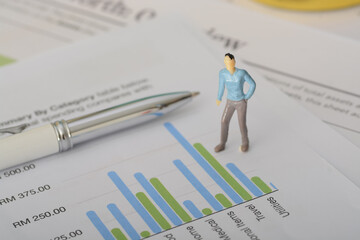 The businessman spent hours meticulously looking at the sales graph, seeking patterns and insights...