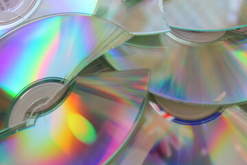 The Australian and Aboriginal flags reflected in a number of broken compact discs representing the...