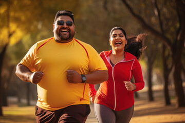 Overweight or fat couple running or jogging together at park.