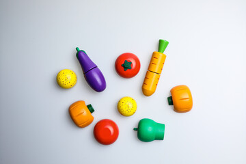 Fresh fruit, vegetables, delicious food, Hamburger and pizza. Colorful educational toys from cute...