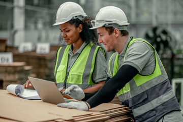 Ethical specialist cuts CO2 in cardboard factory via recycling and renewables, curbing emissions.