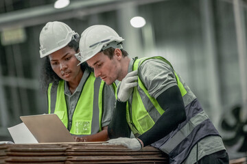 Ethical specialist cuts CO2 in cardboard factory via recycling and renewables, curbing emissions.