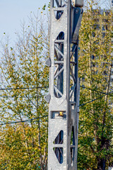 Fragment of the boom of a construction crane on an autumn day