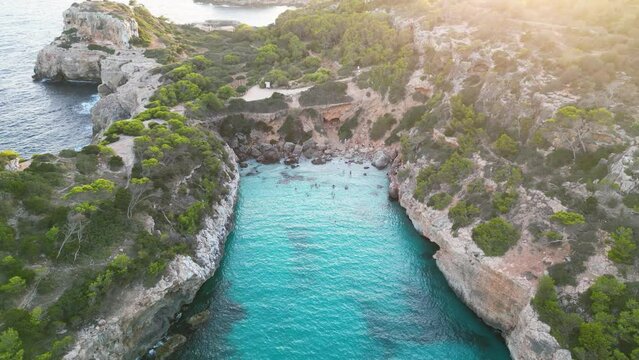 Ascending drone footage of the Calo des Moro beach in Mallorca Island, Balearic Islands, Spain