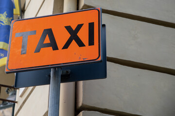 taxi sign road signage text street sign indicating the stopping and waiting station for car taxis
