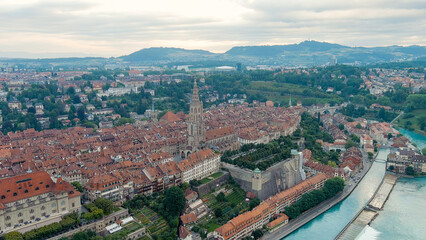 Fototapeta na wymiar Bern, Switzerland. Bern Cathedral. Panorama of the city with a view of the historical center. Summer morning, Aerial View