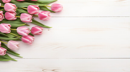 Pink tulips bouquet on a white wooden table mothers