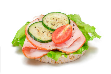 Light Breakfast. Quick and Healthy Sandwich. Rice Cake with Ham, Tomato, Fresh Cucumber and Green Salad - Isolated on White