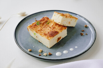 delicate dessert cottage cheese casserole on a light background