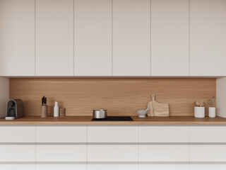 Modern kitchen interior with kitchenware and cooking space with shelves